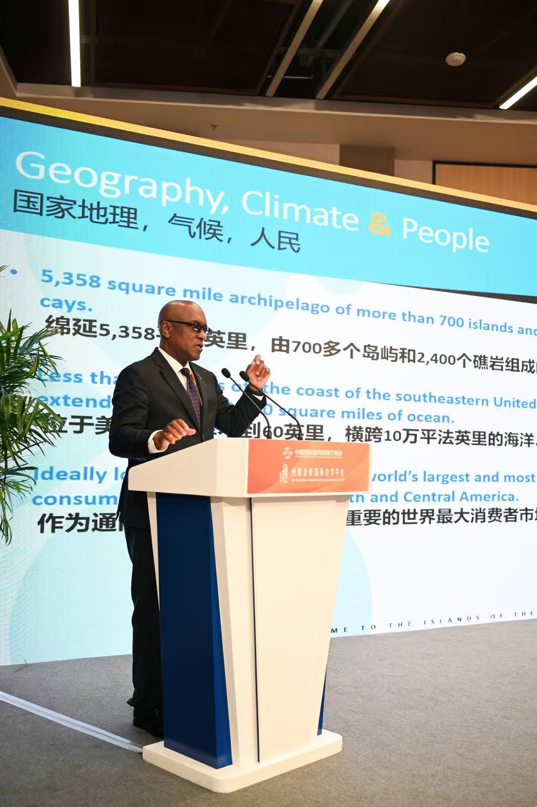 Forum representative delivering an international address